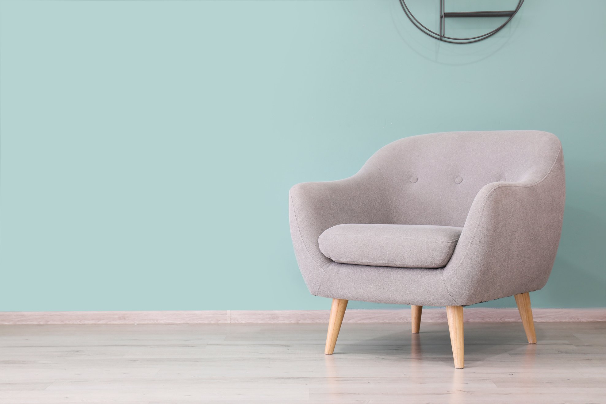 Single Armchair near Light Blue Wall